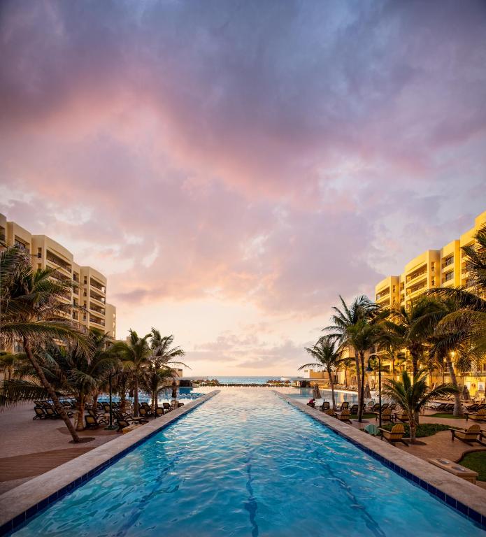 The Royal Sands Resort & Spa All Inclusive pool sunset